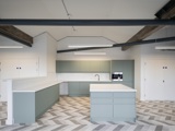Kitchen with green units